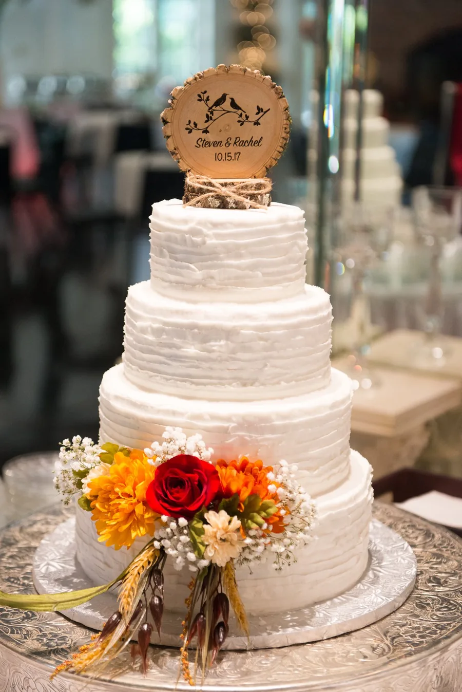 Wedding cake with an autumn floral spray