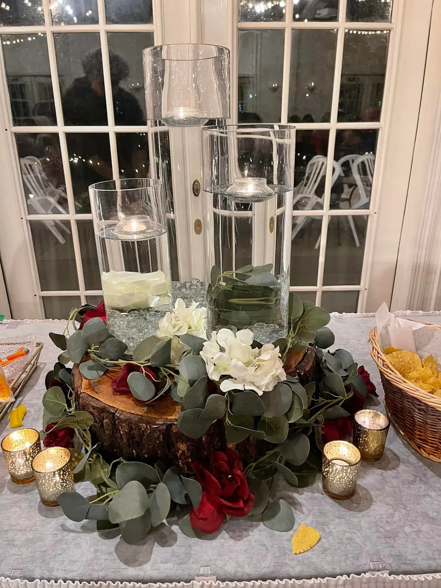 Candle and eucalyptus centerpiece