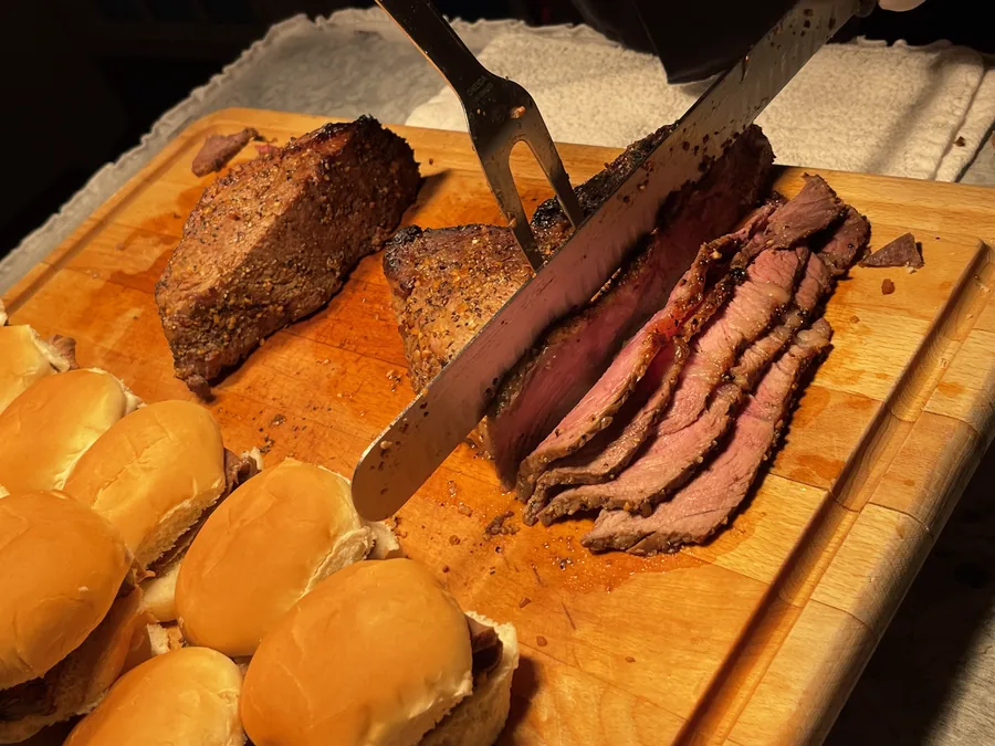 Chef-carved brisket station at a hosted event