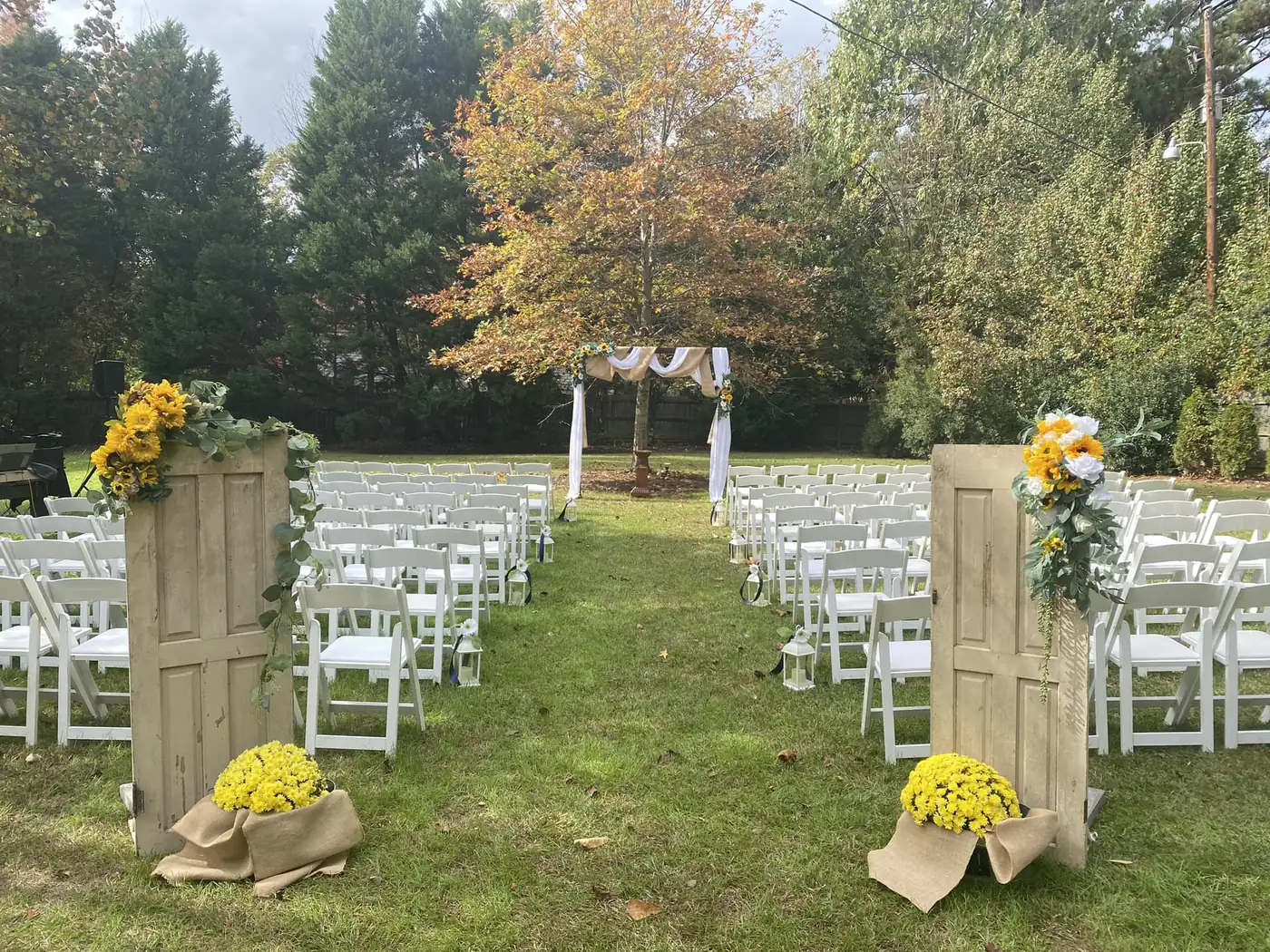 Fall ceremony aisle framed by open doors