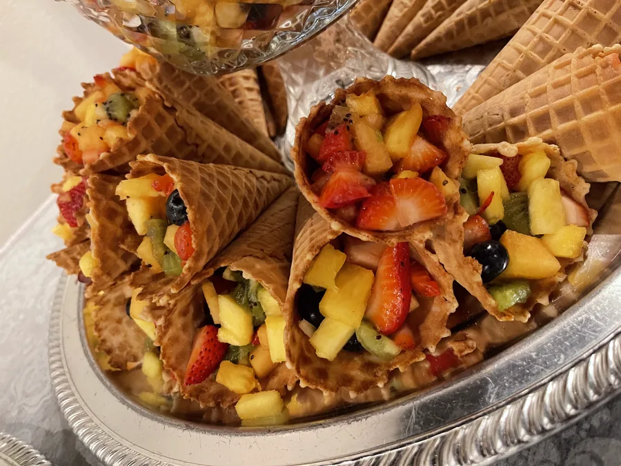 Fresh fruit served in waffle cones