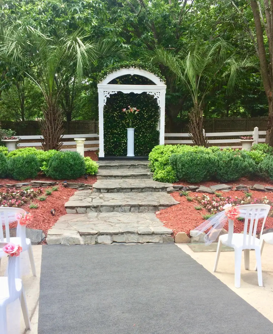 Garden aisle bordered by flower beds