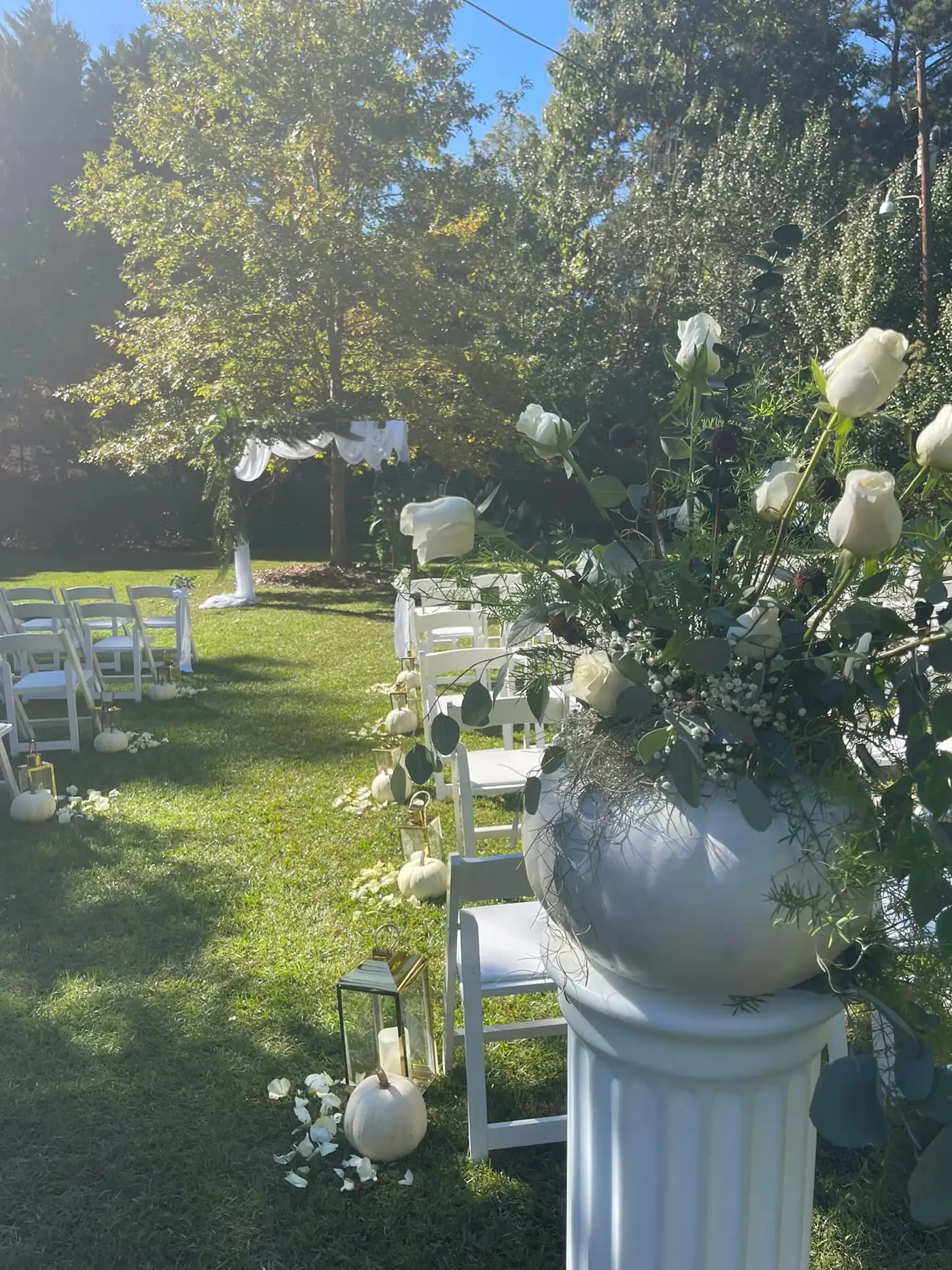 Petal-lined garden ceremony aisle
