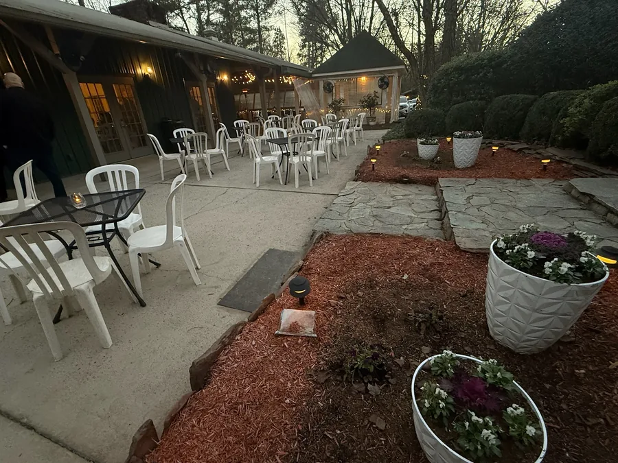 Garden path and planters at dusk