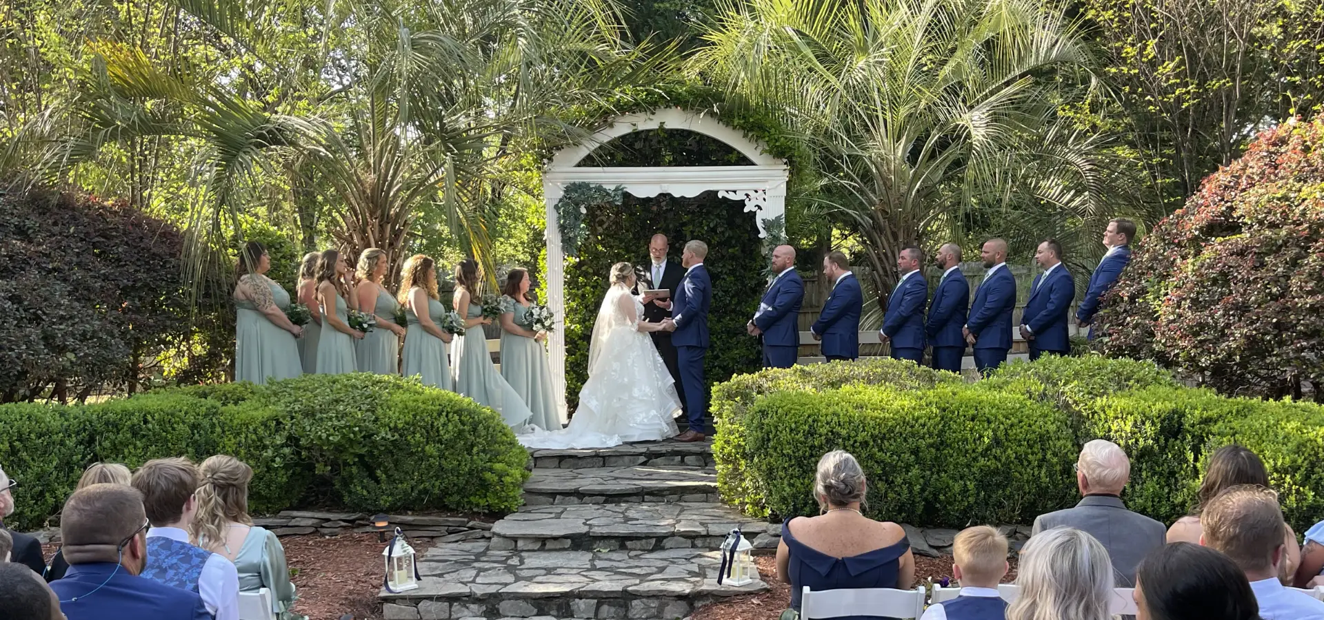 Garden wedding ceremony at Wintergreen Woods at dusk