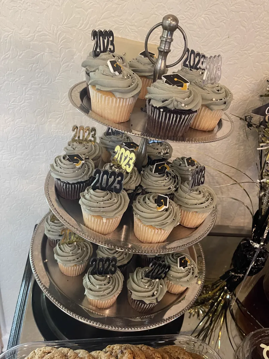 Graduation cupcake tower with gold class-year toppers