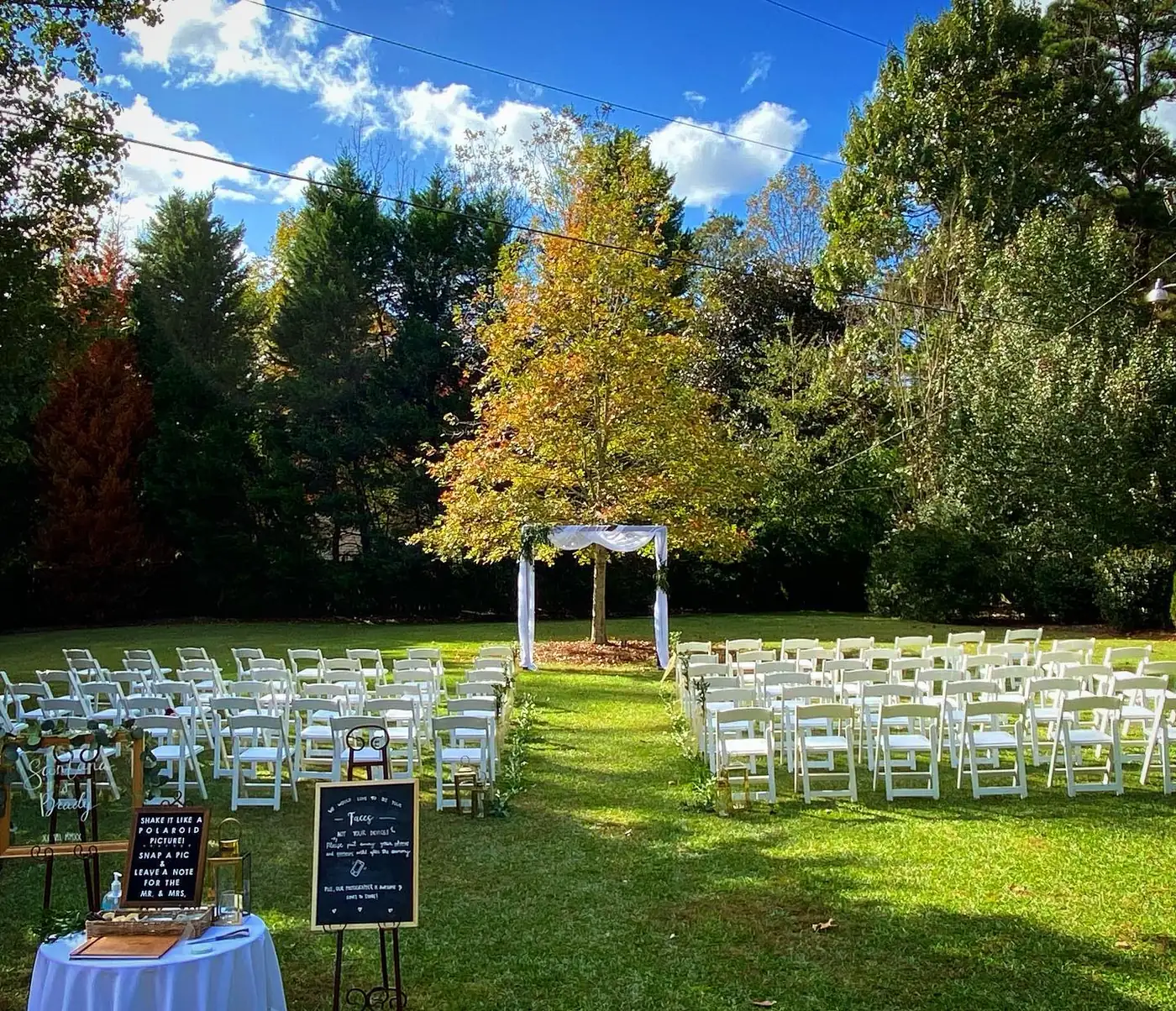 Wedding arch on the lawn under a blue sky