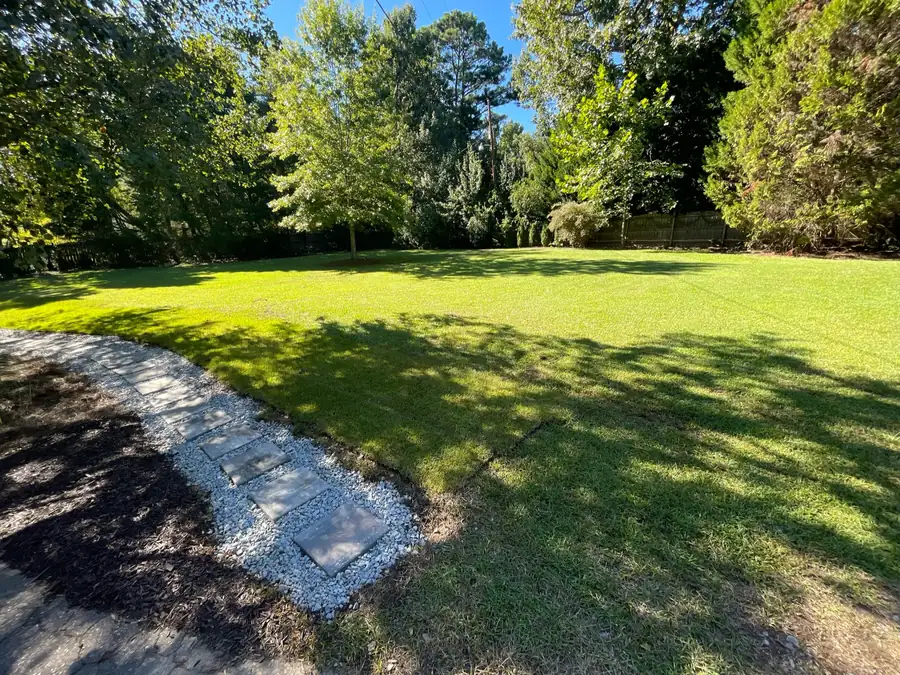 Open lawn with a stone path