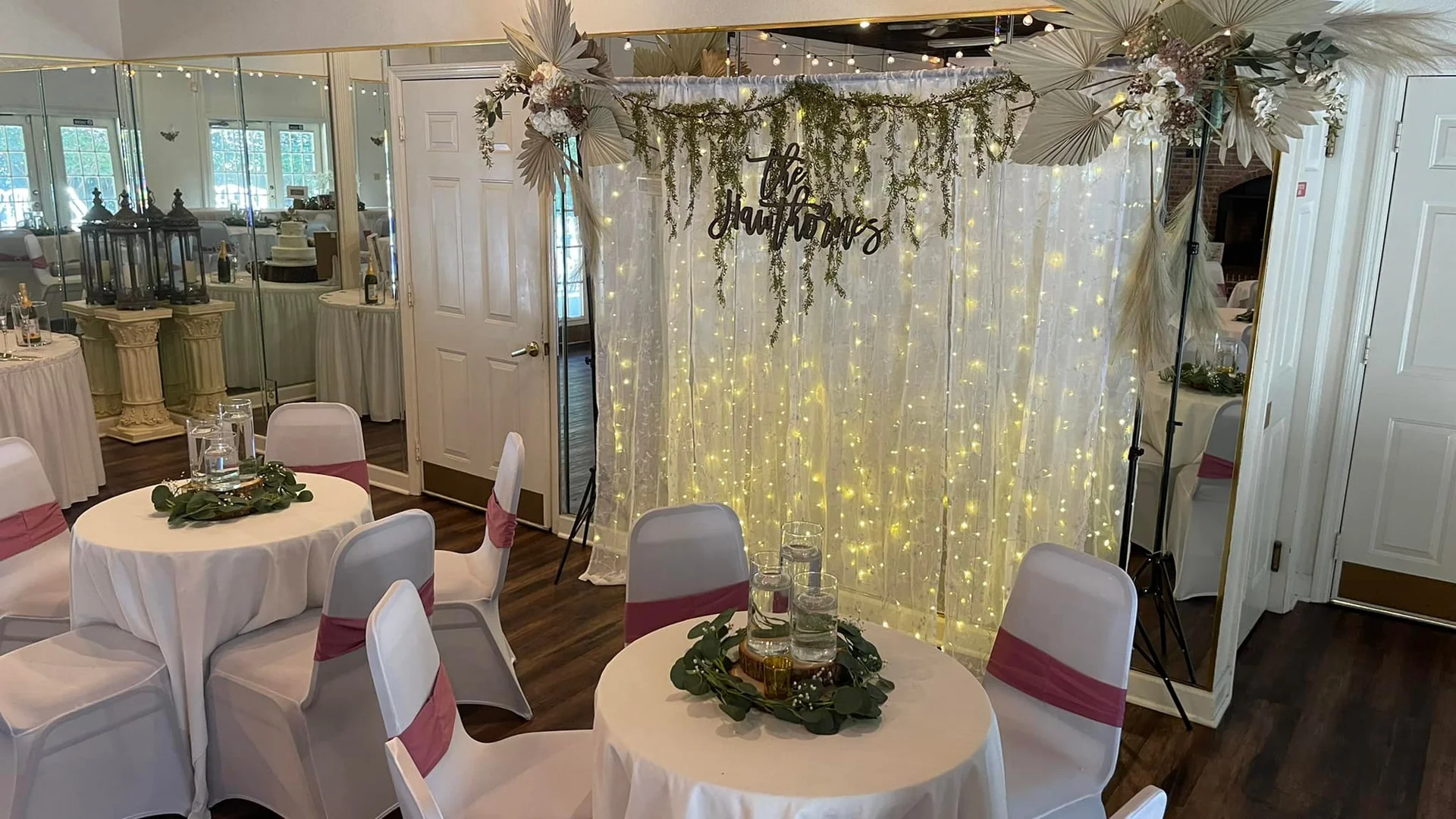 Reception hall with chandelier and ceiling drapery