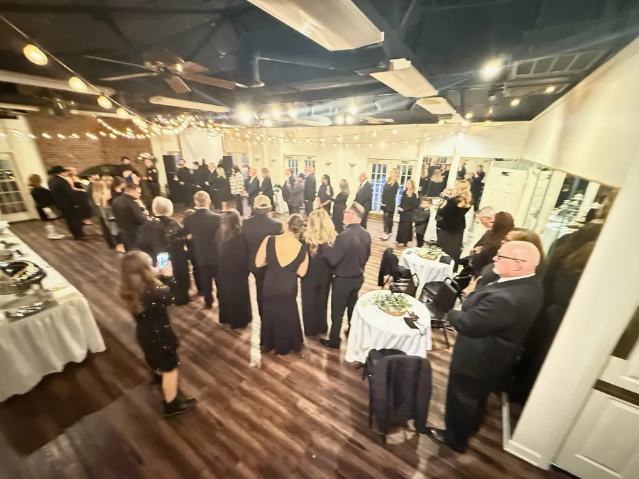 Guests filling the reception hall