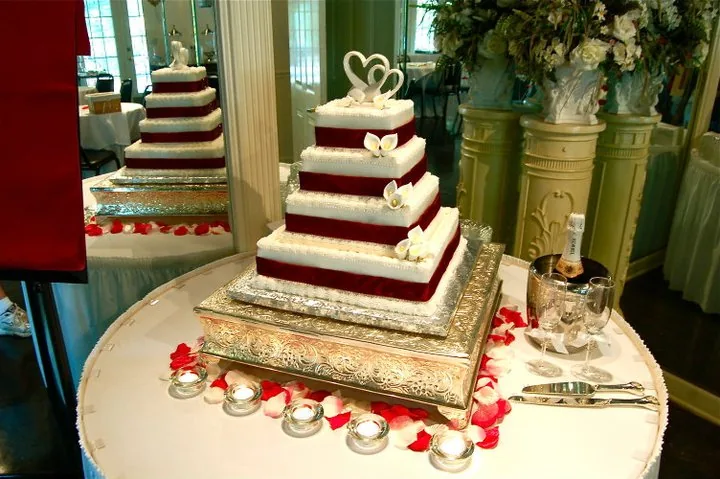 Square tiered wedding cake in red and white