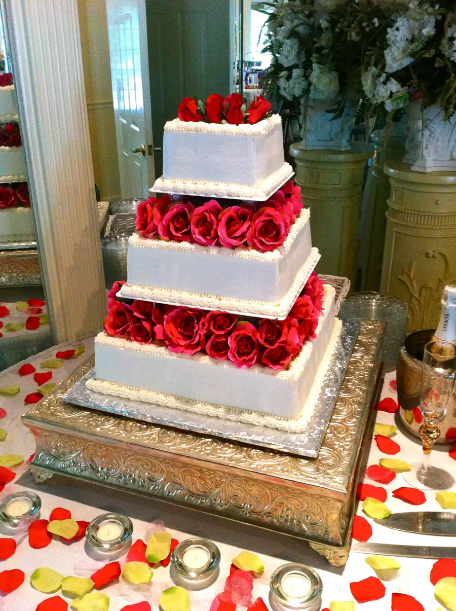 Square wedding cake with red roses