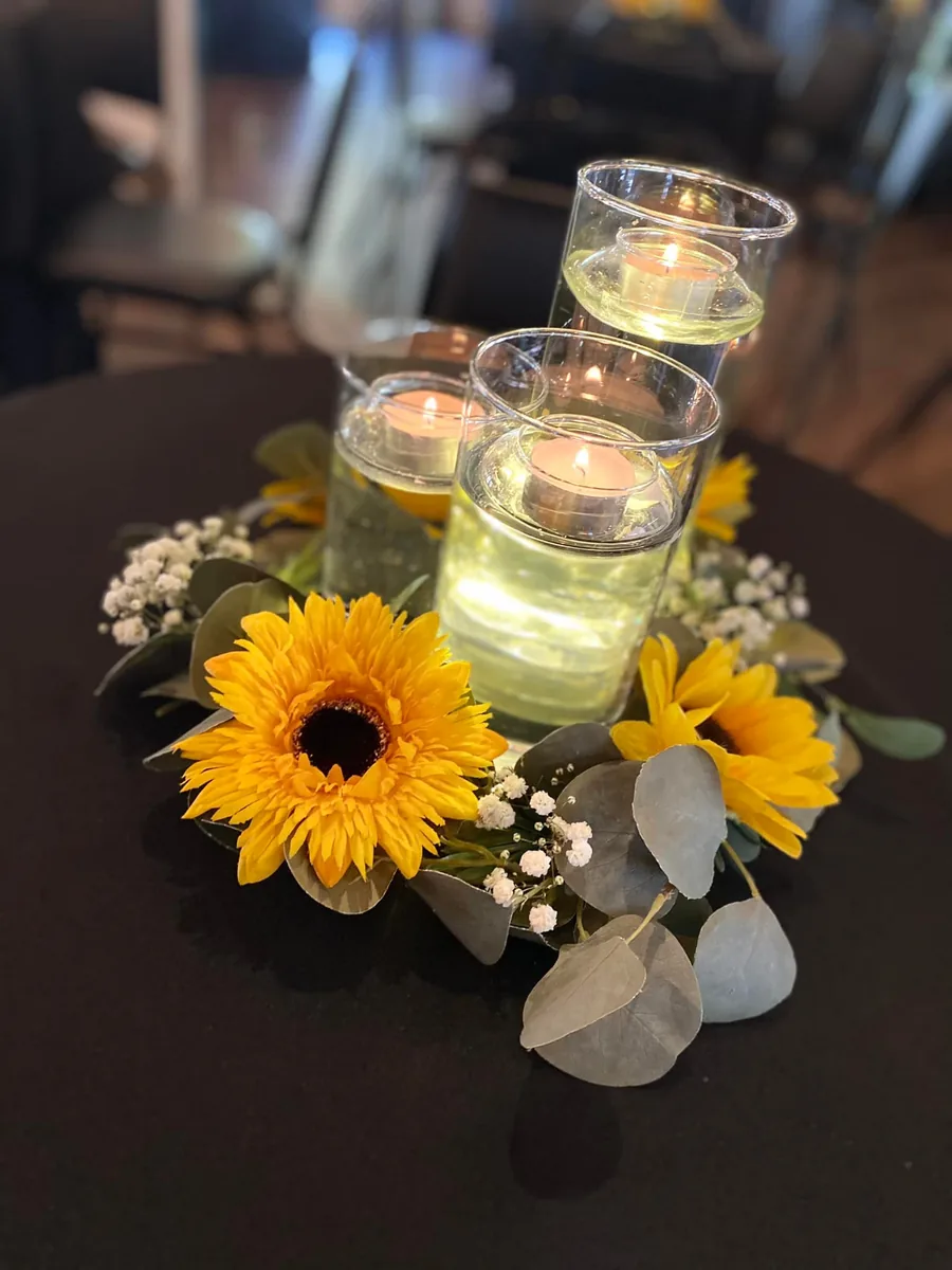 Sunflower and candle centerpiece