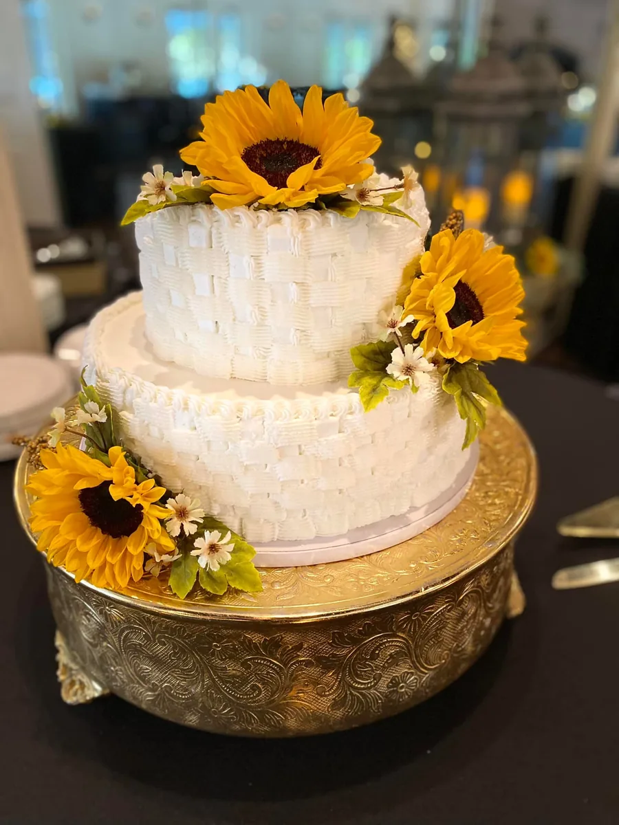 Wedding cake decorated with sunflowers