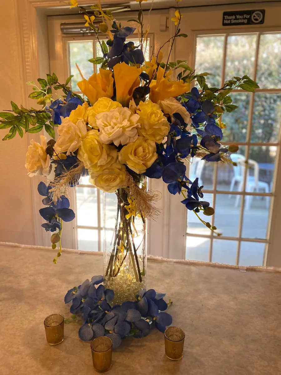 Tall blue and gold centerpiece
