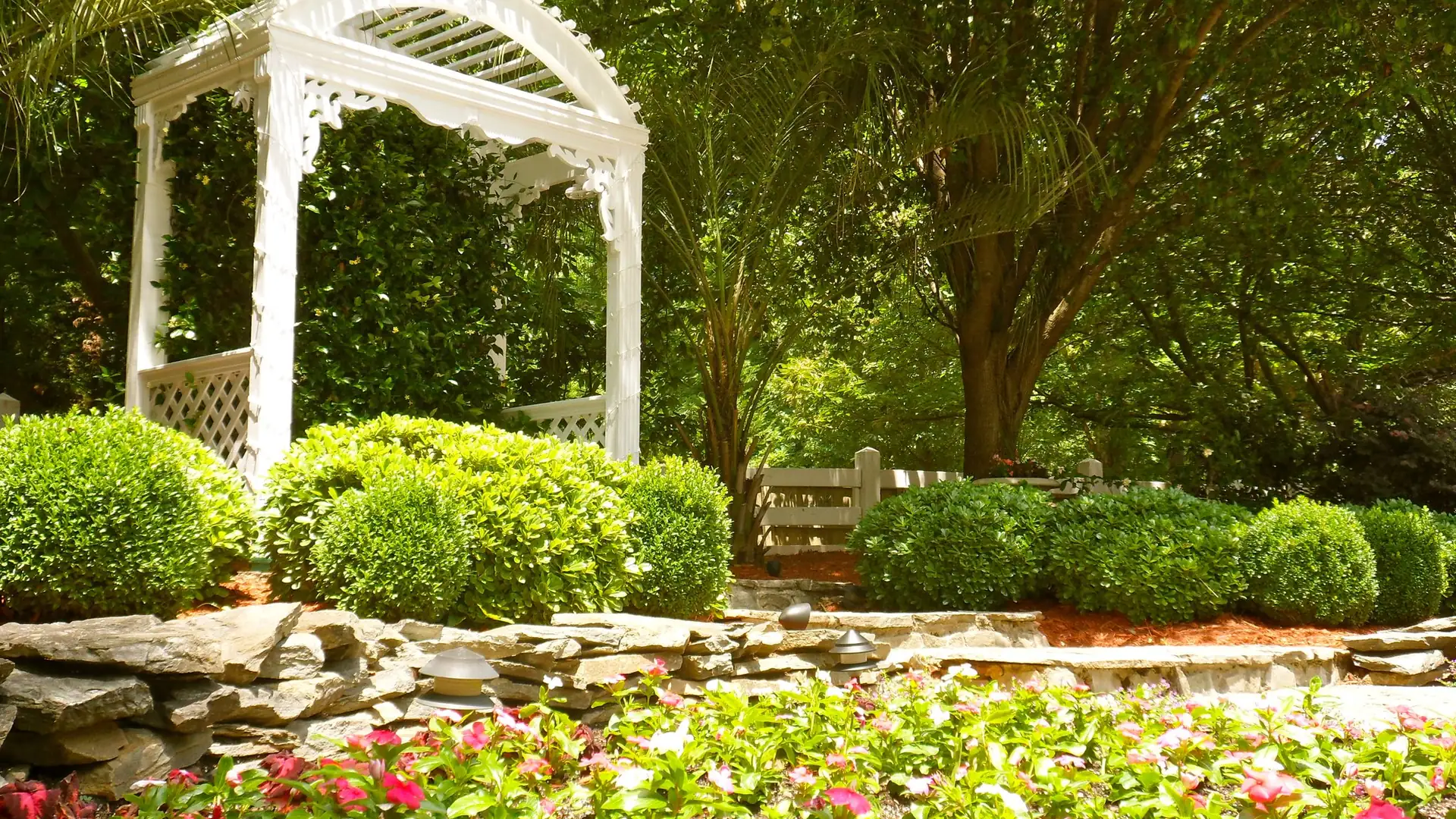 White arbor above the stone garden
